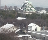 ２０日の冠雪した名古屋城。